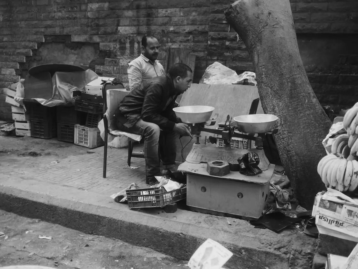 vendor with mechanical balance scale