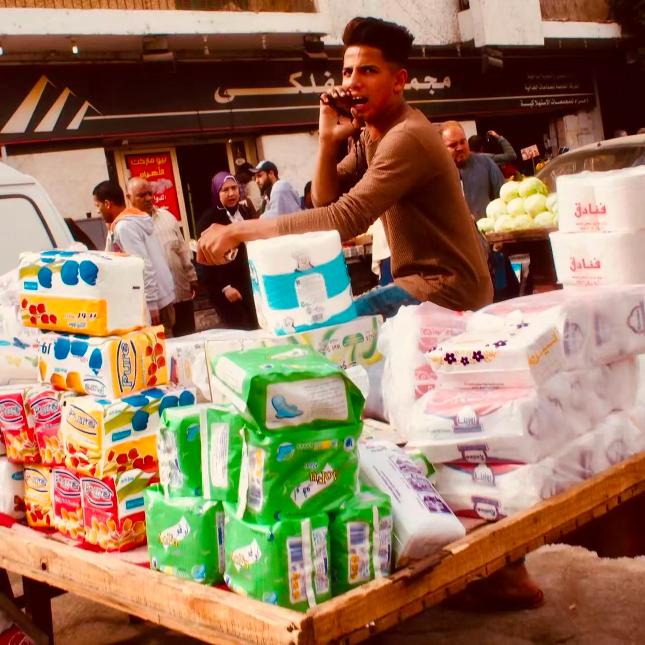 cairo street vendor with paper goods